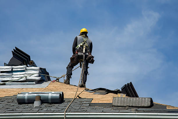 Professional Roof Replacement technician working in Somerset, TX